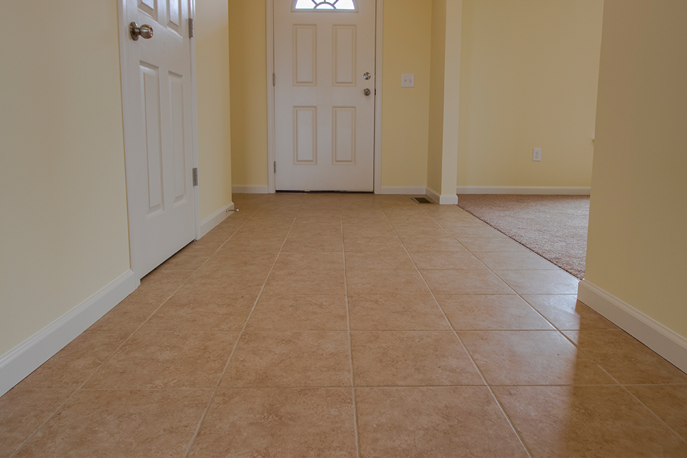 Choose carpet over tile.